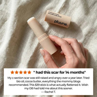Hand holding an open Pluune c-section scar stick on linen, with a 5-star review titled "had this scar for 14 months"