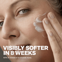 Close-up of a woman smoothing cream onto her cheek, with the headline "Visibly softer in 8 weeks"