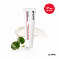 Pluune Time Reverse Cream tube on a swatch of white cream with centella leaves and a "30K+ Women" badge